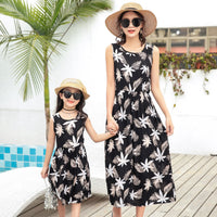 Matching vacation outfits for mother and daughter