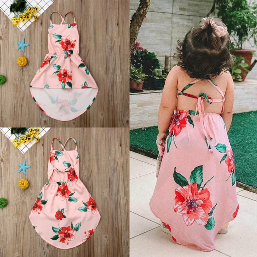 Baby girl wearing a high-quality birthday dress with beautiful floral design
