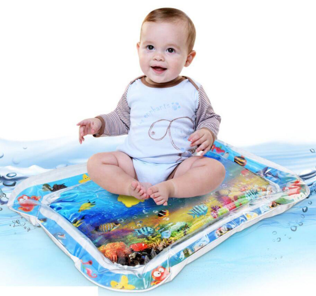 Infant enjoying summer water mat