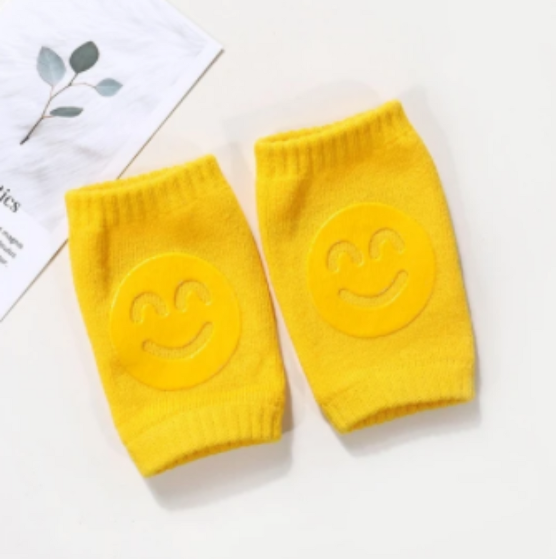 Baby knee pads with built-in socks
