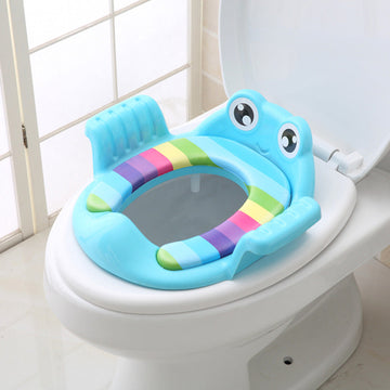 Child using comfortable toilet seat