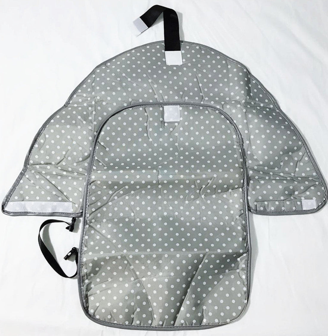 Portable changing pad fitting in diaper bag