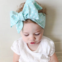 Baby hair tie with delicate lace bow