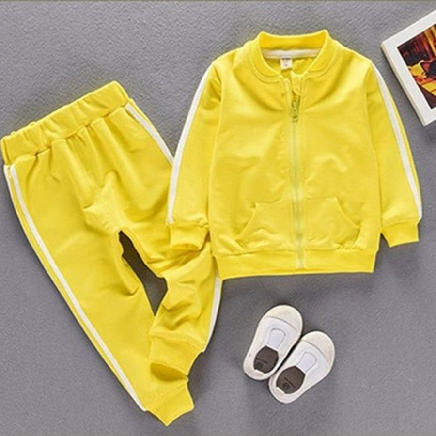 Baby in a vibrant sportswear set, perfect for playtime.
