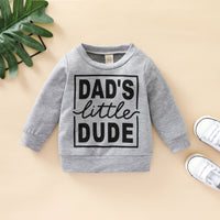Child's grey sweatshirt with letter graphics, made from soft polyester fabric.