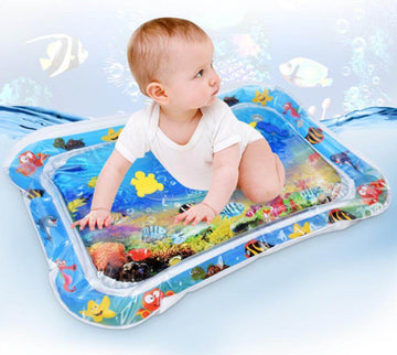 Baby playing on inflatable water mat