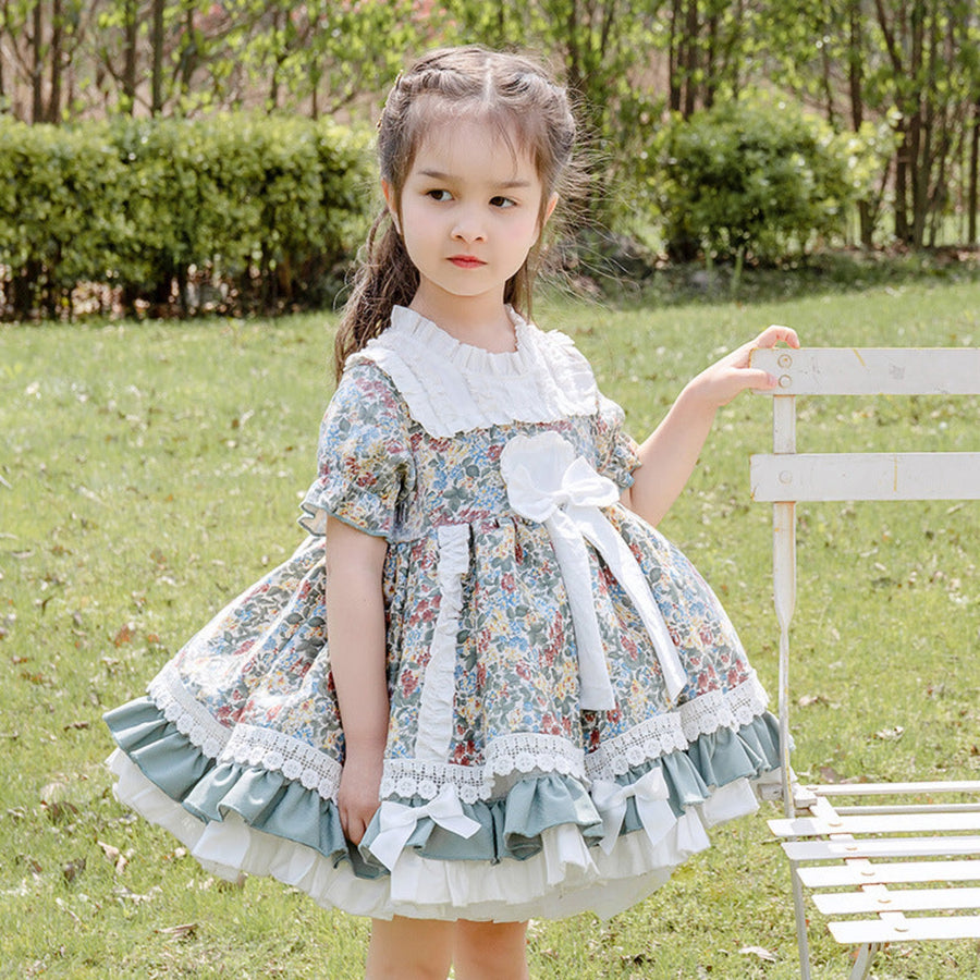 Girl Baby Floral Short Sleeve Dress - Adorable and vibrant, perfect for your little onClose-up of a cute baby girl dress featuring a vibrant floral print.e's summer wardrobe