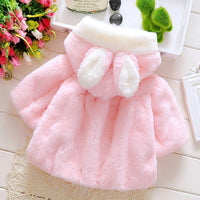 Cute winter coat for girls with a playful rabbit ear design.
