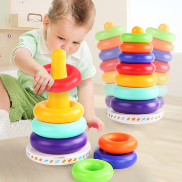 Baby playing with colorful tumbler lap toy