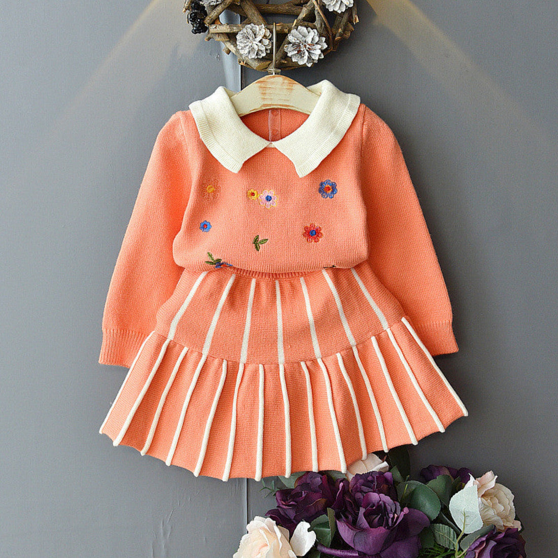 Close-up of an adorable girls outfit set with matching top and bottoms.