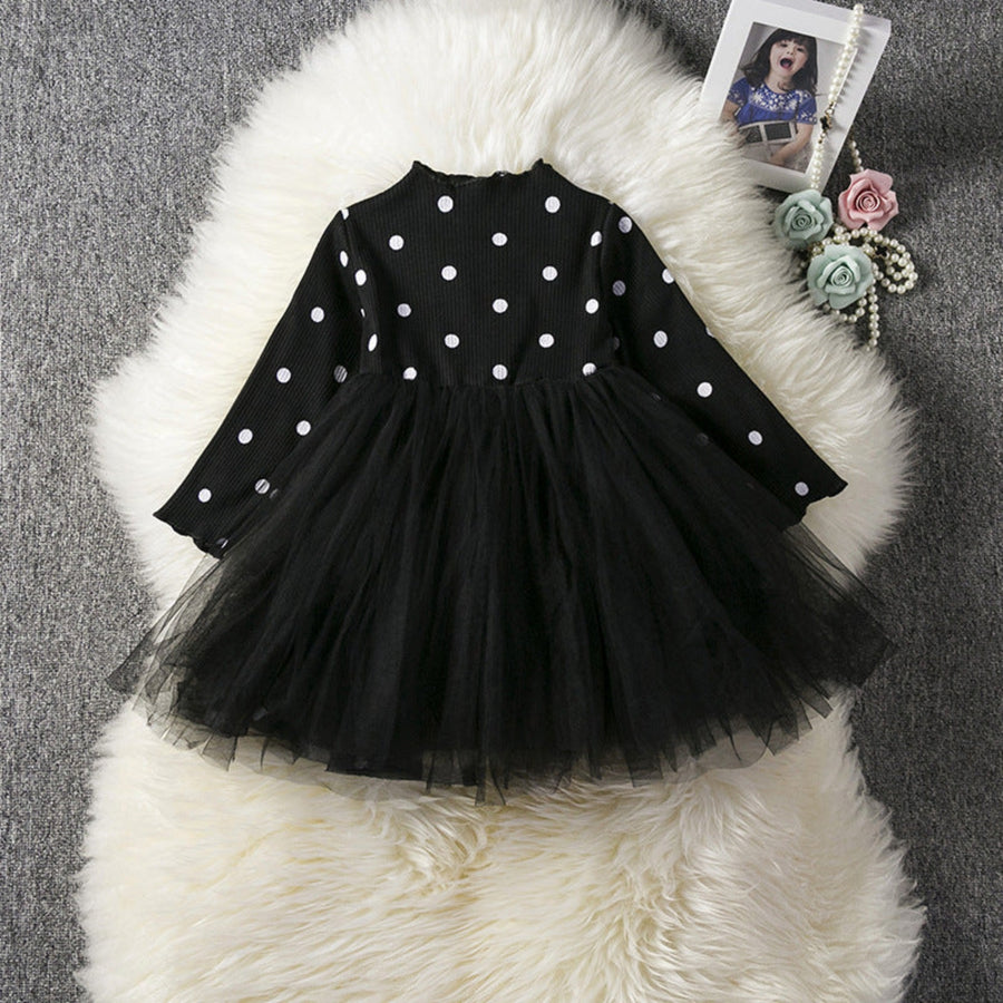 Elegant infant tutu dress showcasing soft lace bodice and layered skirt.