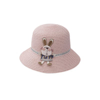 Straw hat perfect for summer picnics with rabbit decoration